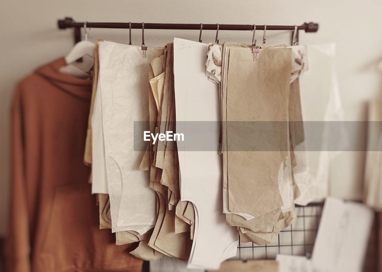 Close-up of clothes hanging on rack