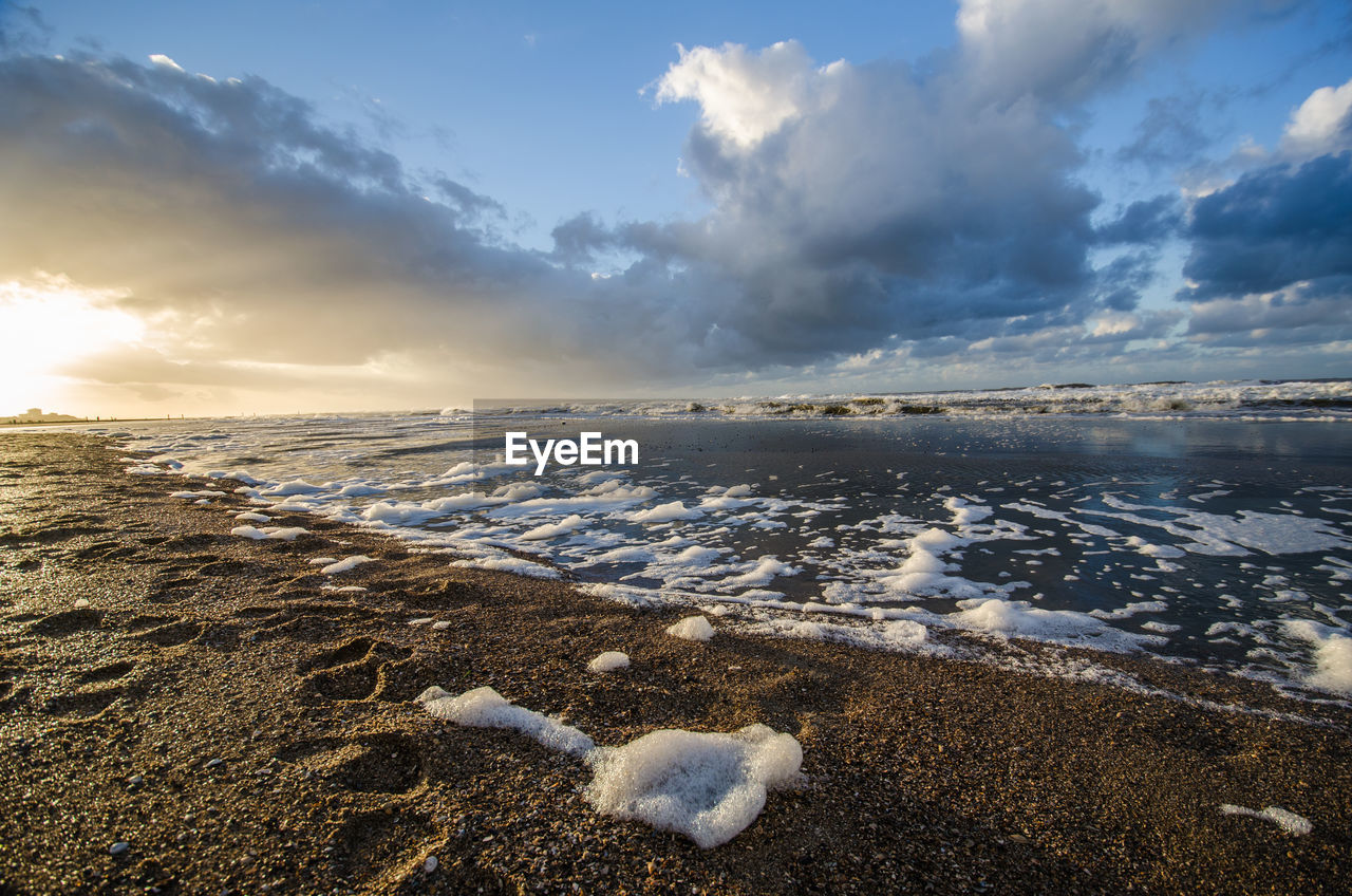 Scenic view of sea against sky during winter