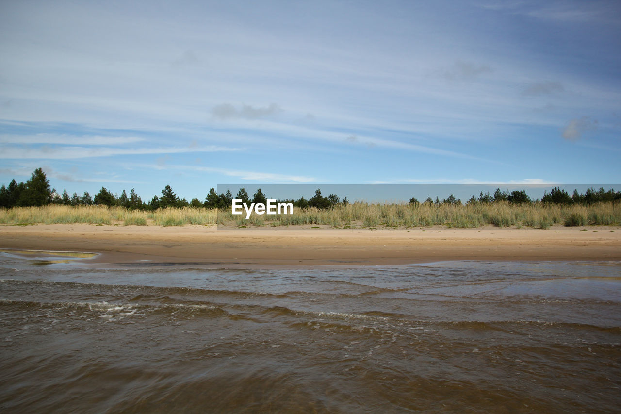 Scenic view of beach against sky