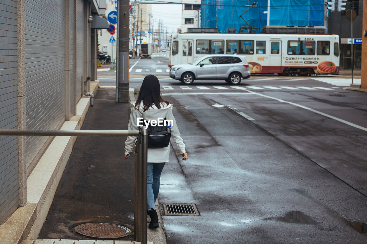 Woman walking on streets wandering