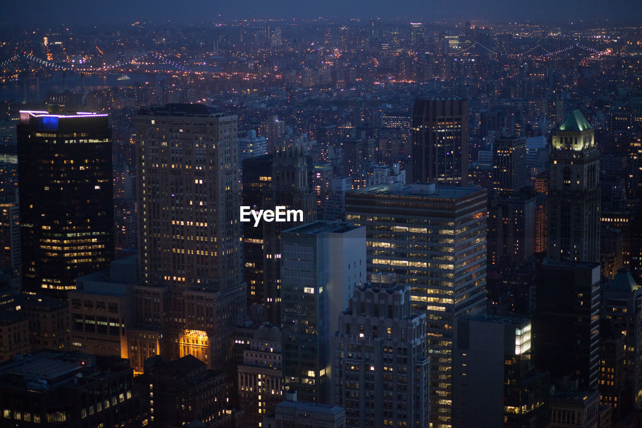 High angle view of illuminated cityscape at night