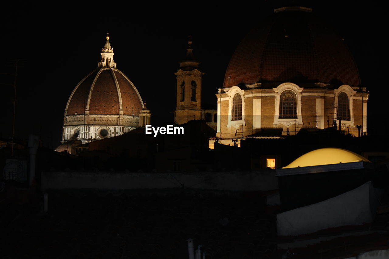 LOW ANGLE VIEW OF CHURCH AT NIGHT