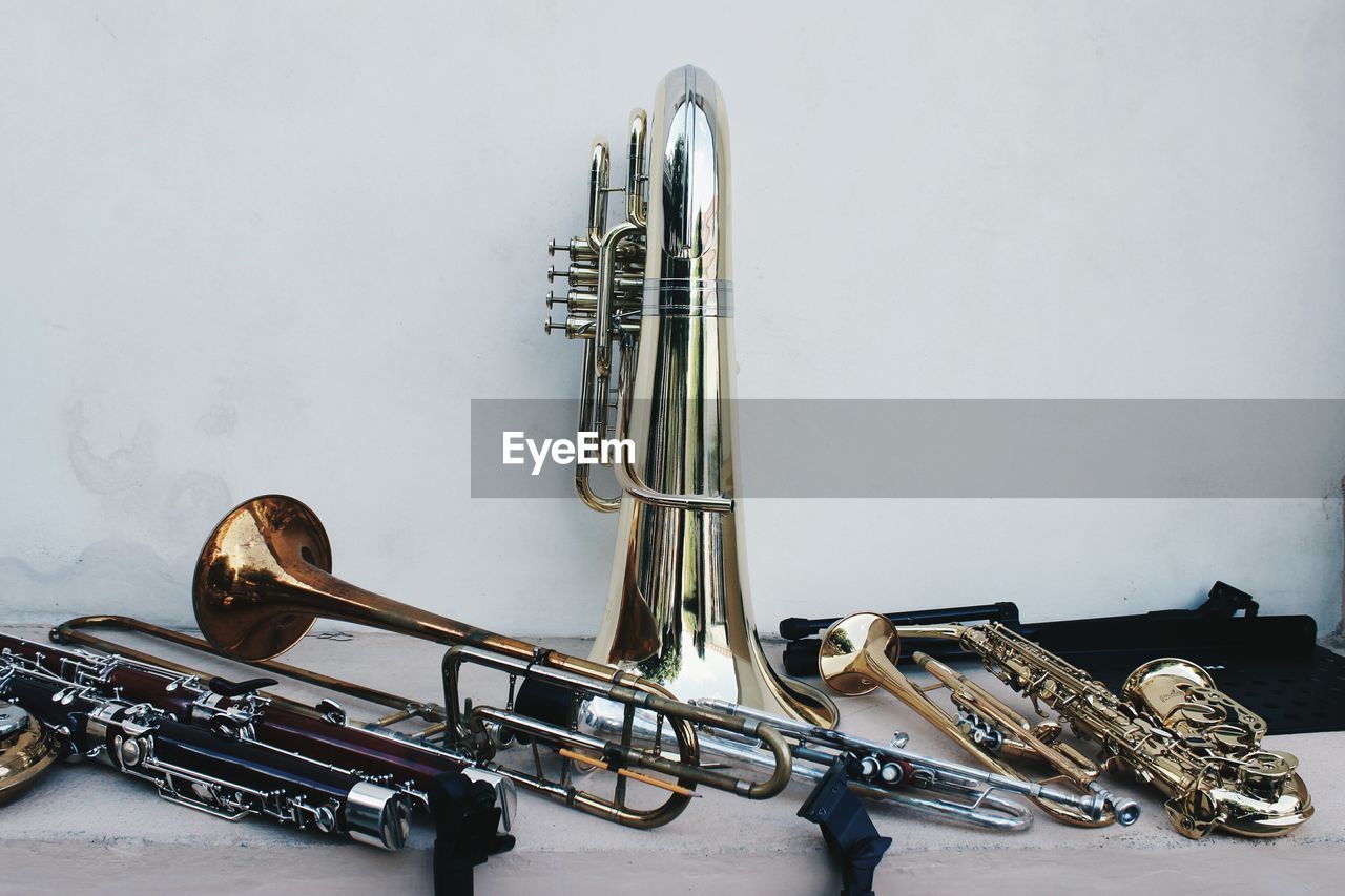 Close-up of wind instruments on table