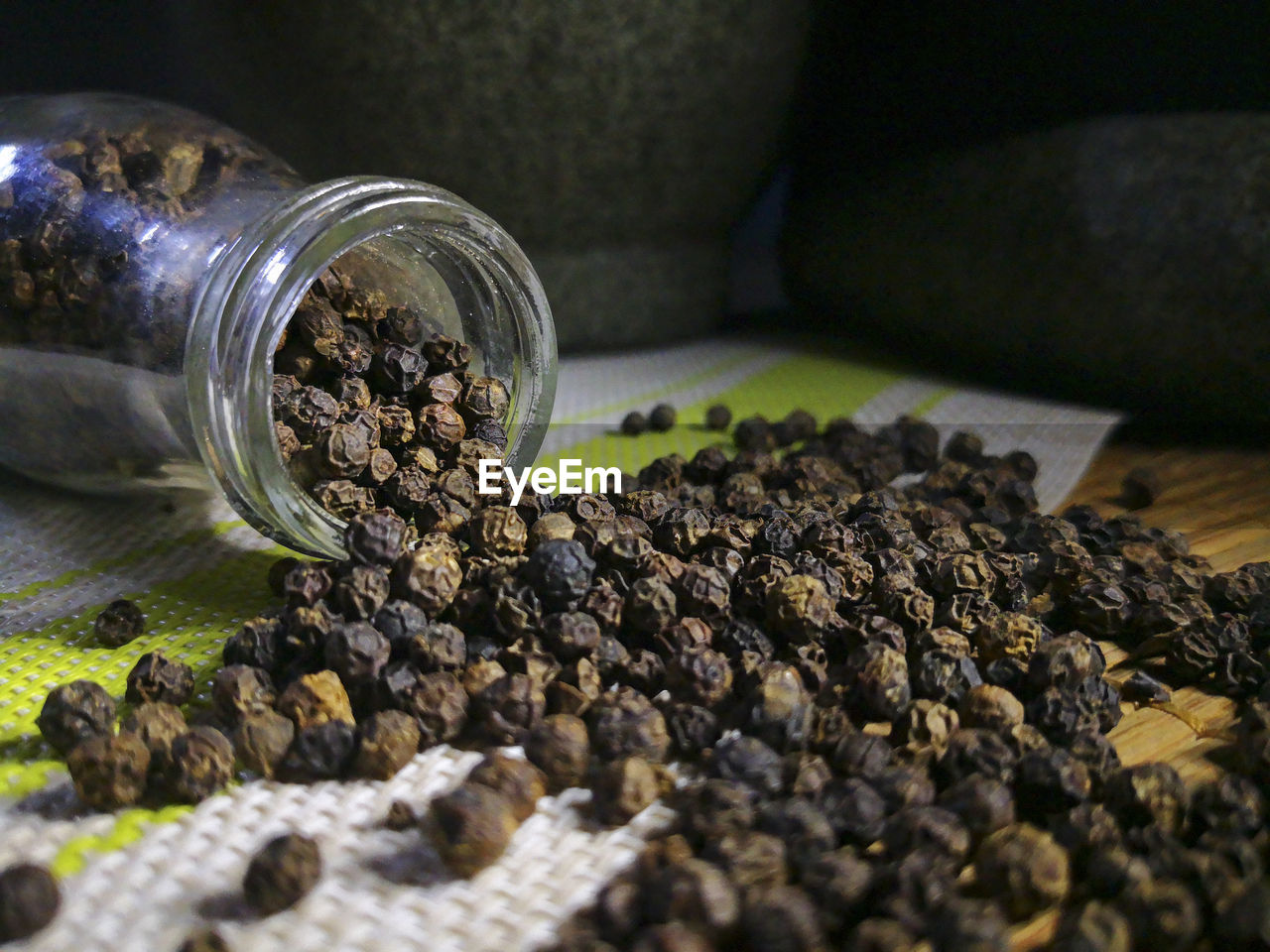 CLOSE-UP OF COFFEE BEANS IN JAR