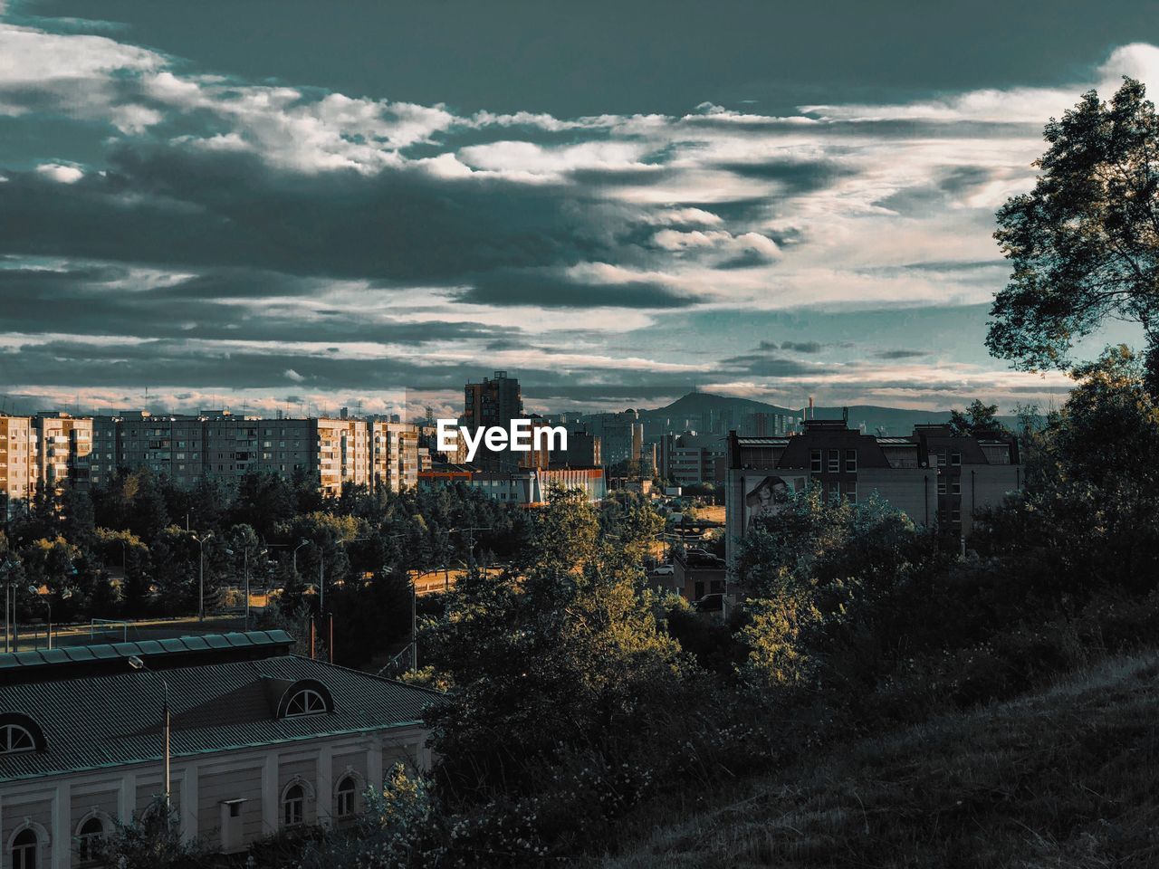 High angle view of buildings against sky during sunset