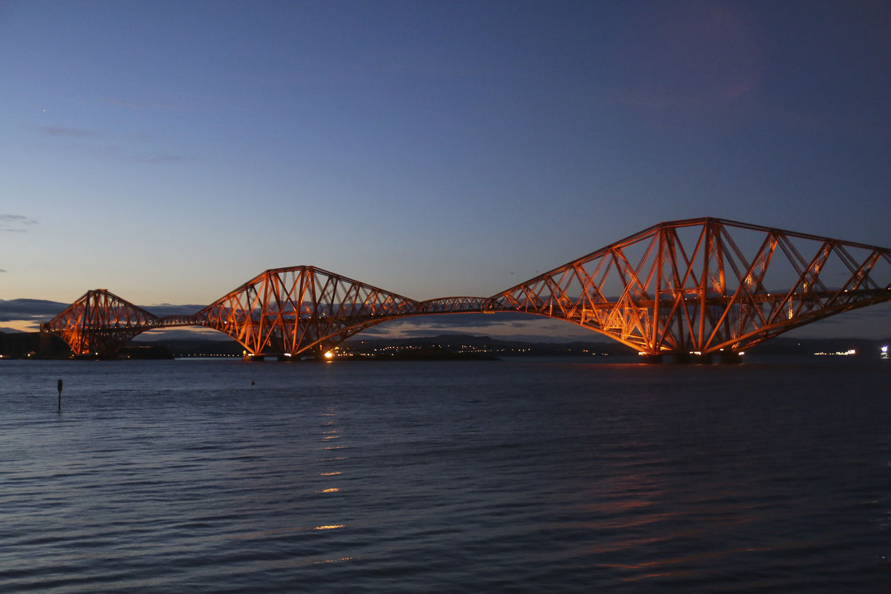 BRIDGE OVER RIVER AGAINST CLEAR SKY