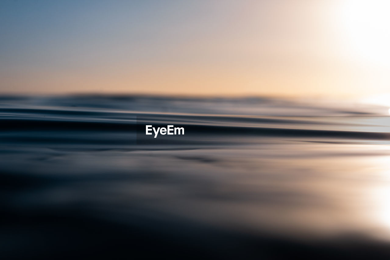 Selective focus of sea waves at sunset