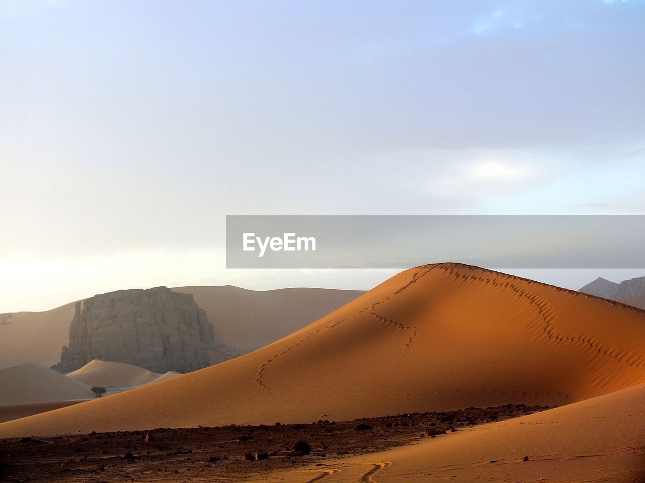 Scenic view of desert against sky