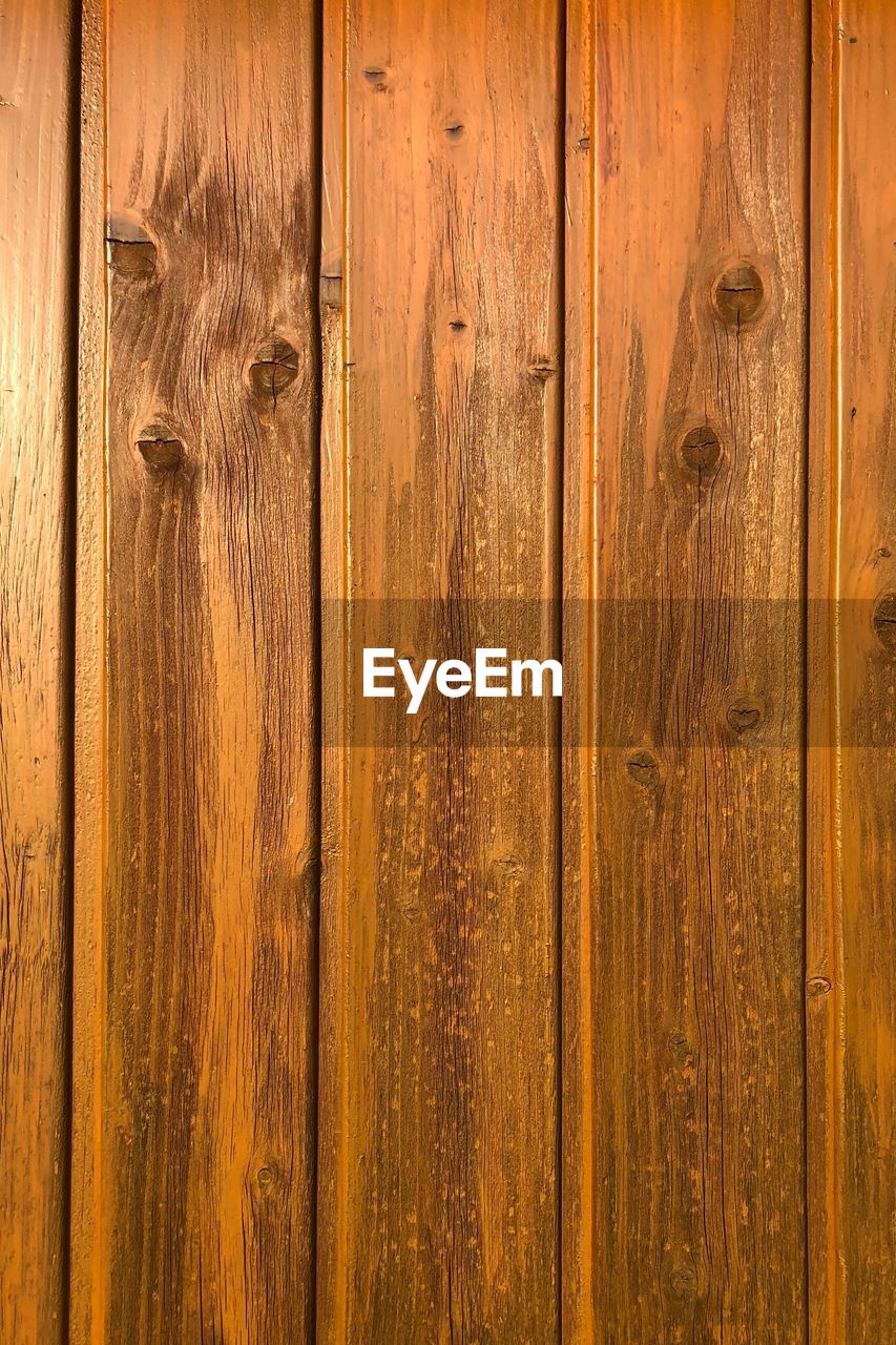 FULL FRAME SHOT OF WOODEN DOOR WITH FLOORING