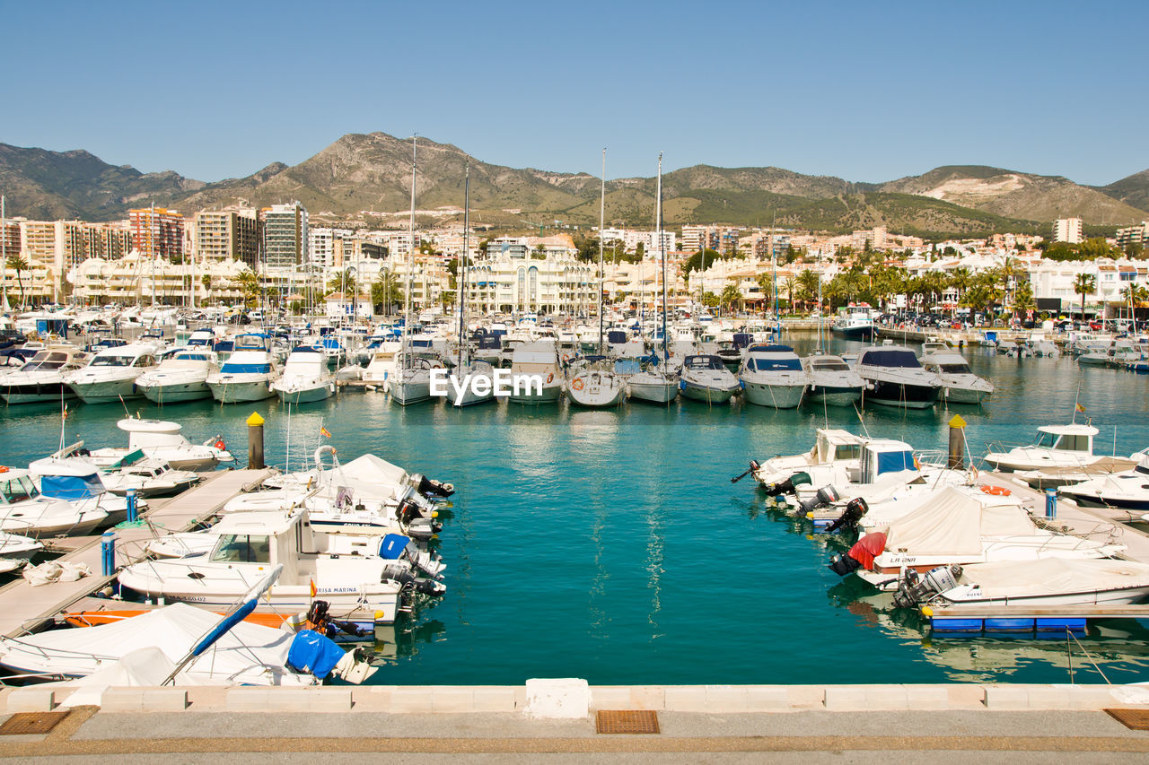 Boats moored in harbor