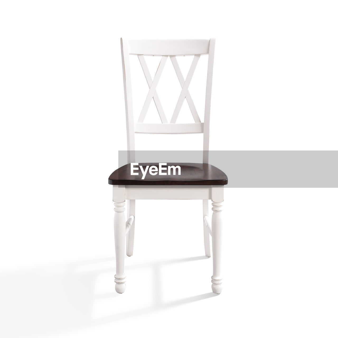 VIEW OF EMPTY CHAIRS AGAINST WHITE BACKGROUND