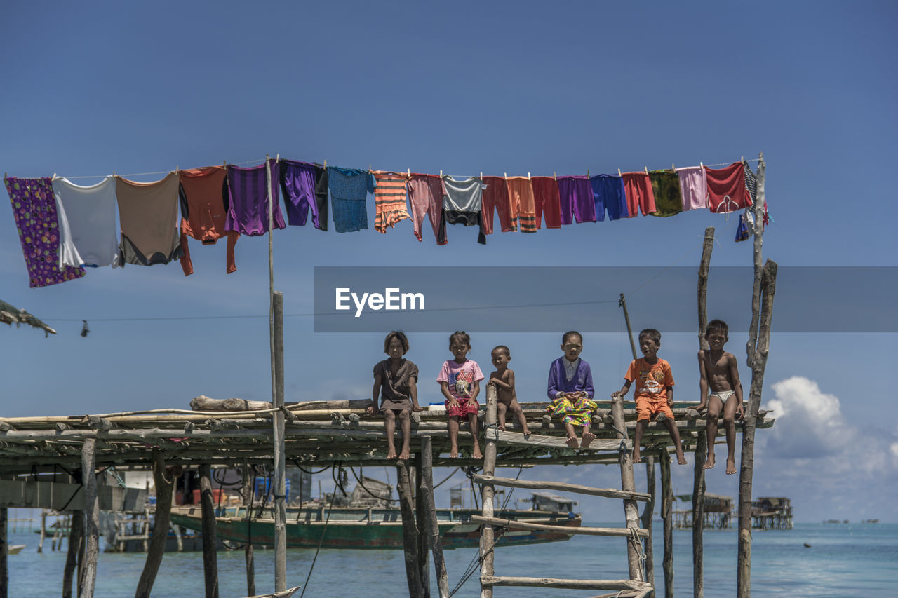 VIEW OF PEOPLE IN WATER