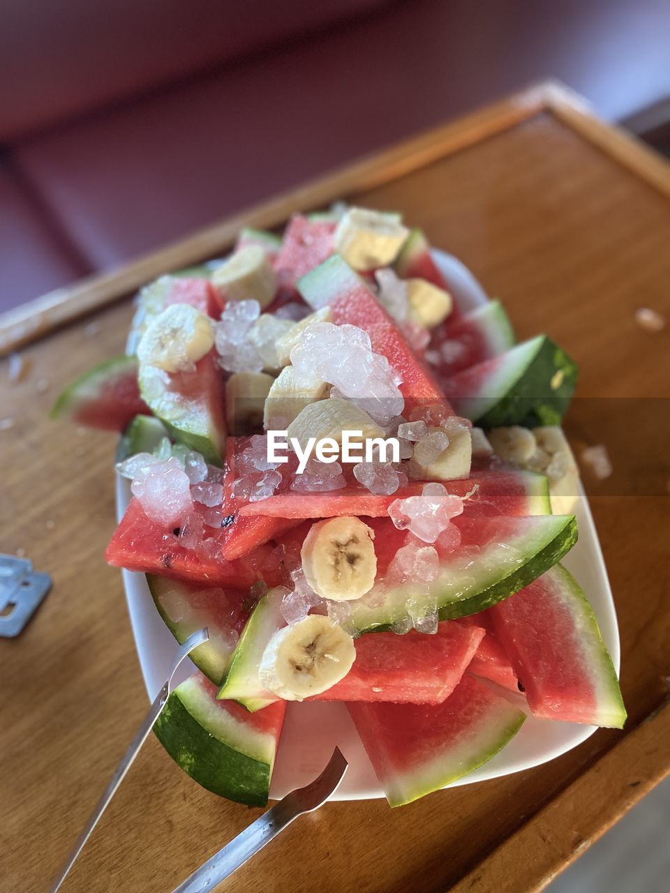 food and drink, food, healthy eating, fruit, salad, wellbeing, vegetable, freshness, dish, melon, watermelon, slice, wood, meal, produce, cucumber, cuisine, no people, plant, indoors, dairy, plate, table, high angle view, pork