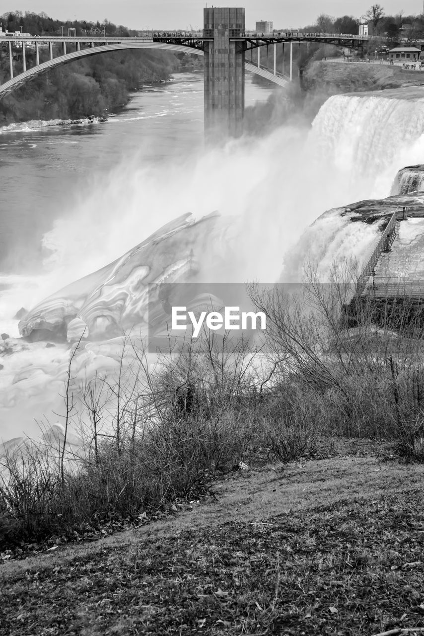 Scenic view of river flowing through land