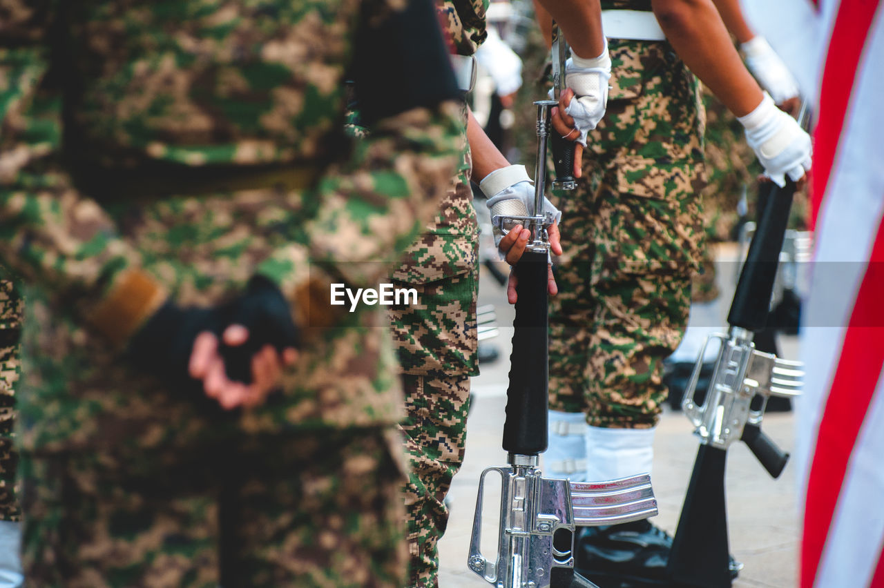 Army soldiers with rifle during parade