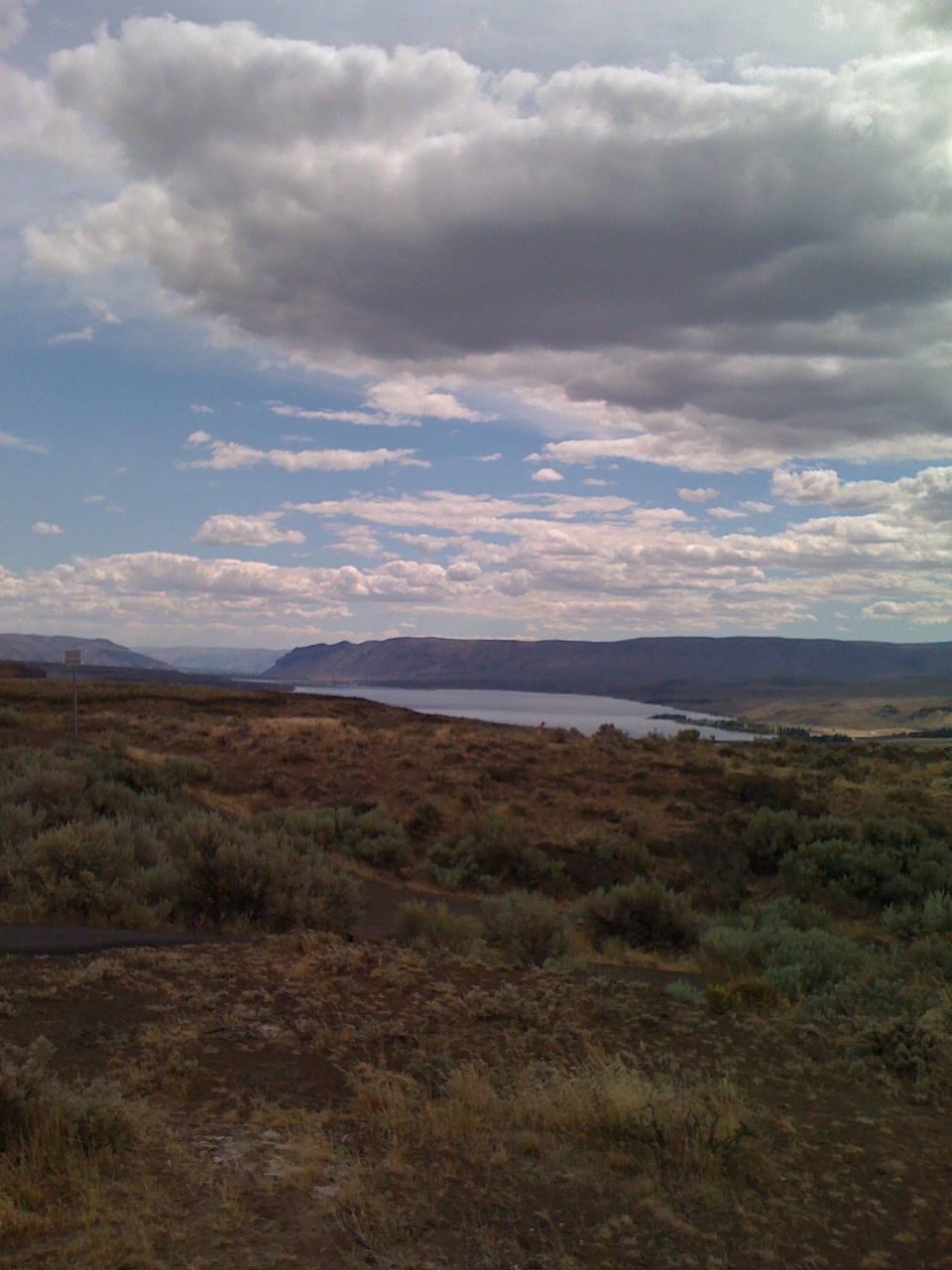 VIEW OF LANDSCAPE AGAINST CLOUDY SKY