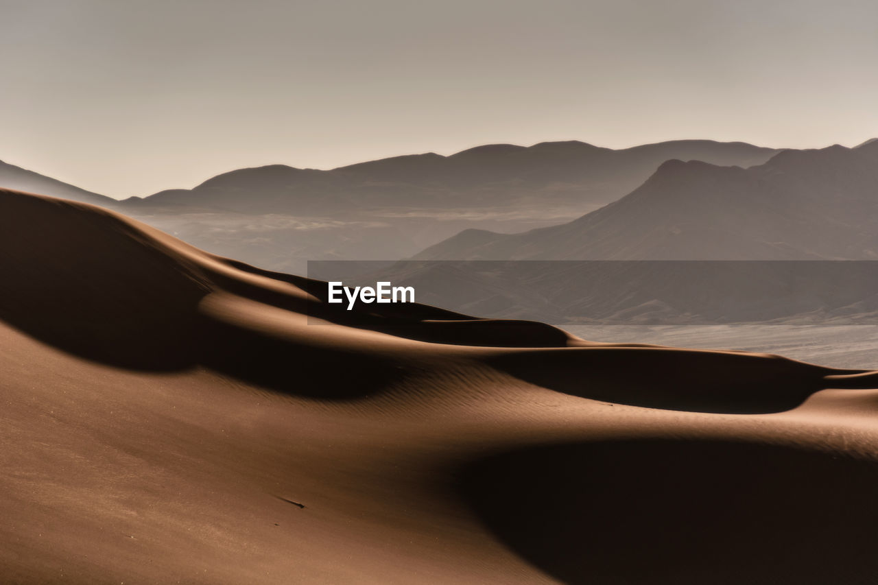 Scenic view of desert against sky