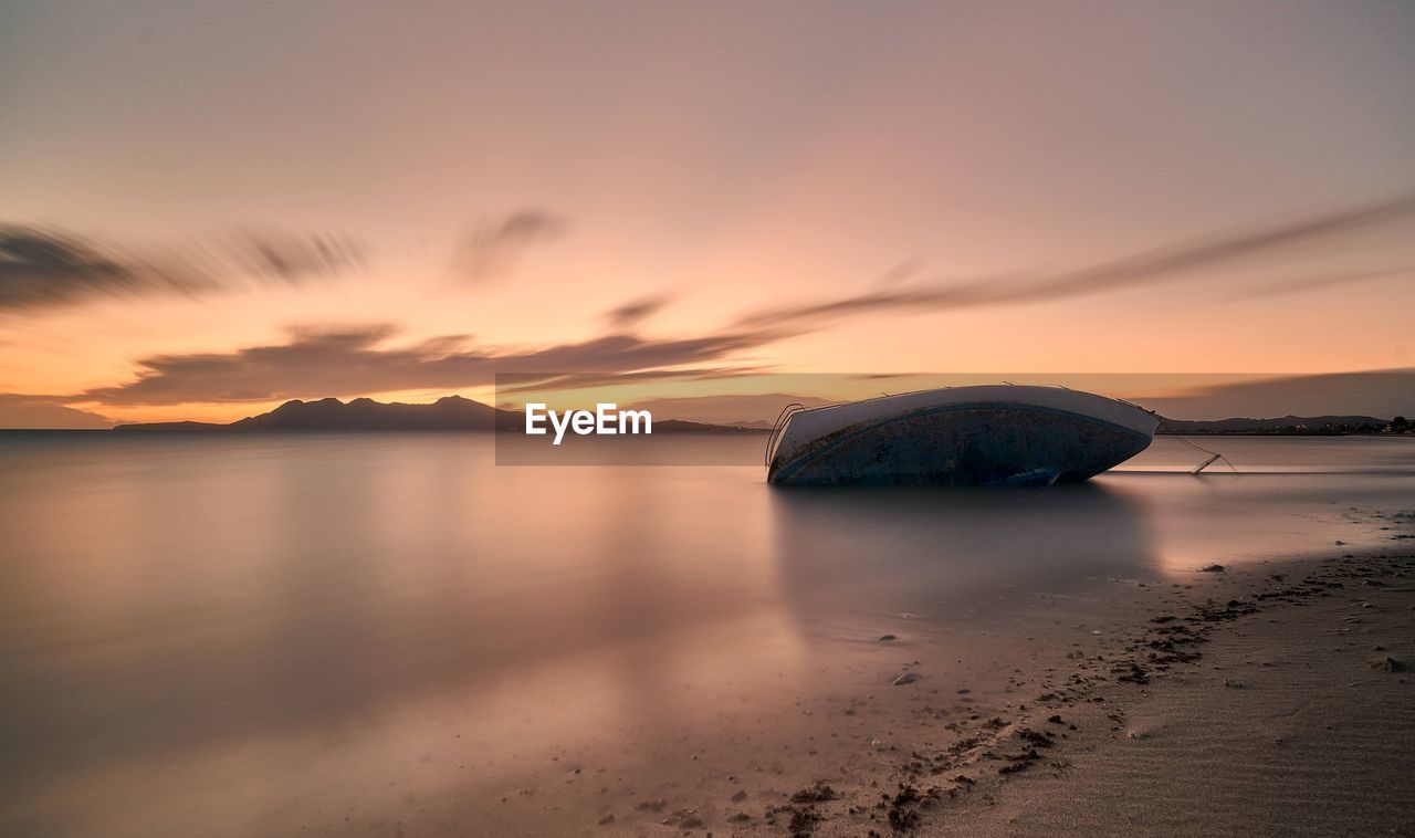 SCENIC VIEW OF SEA DURING SUNSET