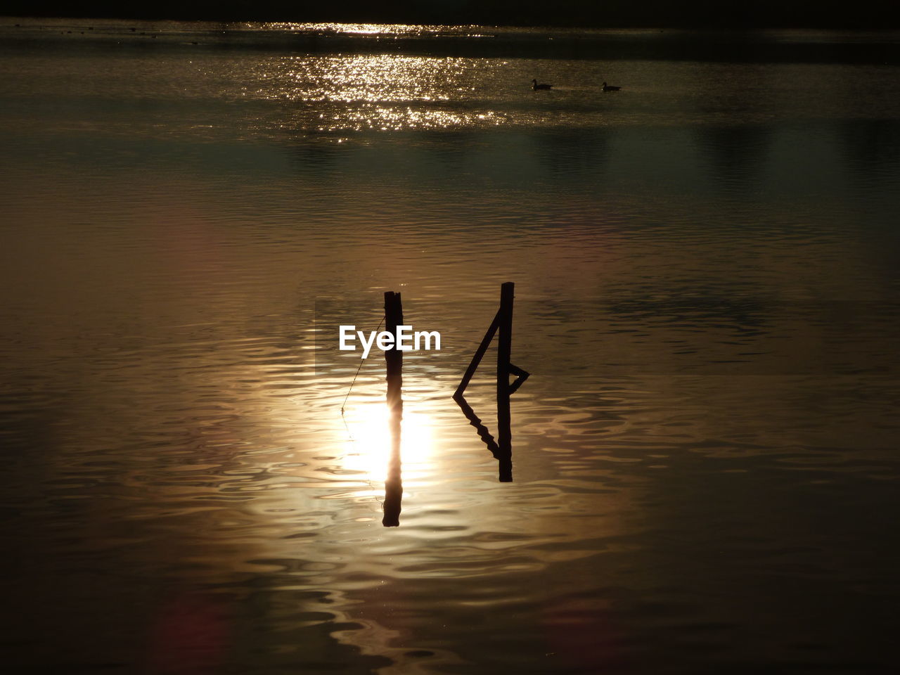 VIEW OF LAKE AT SUNSET