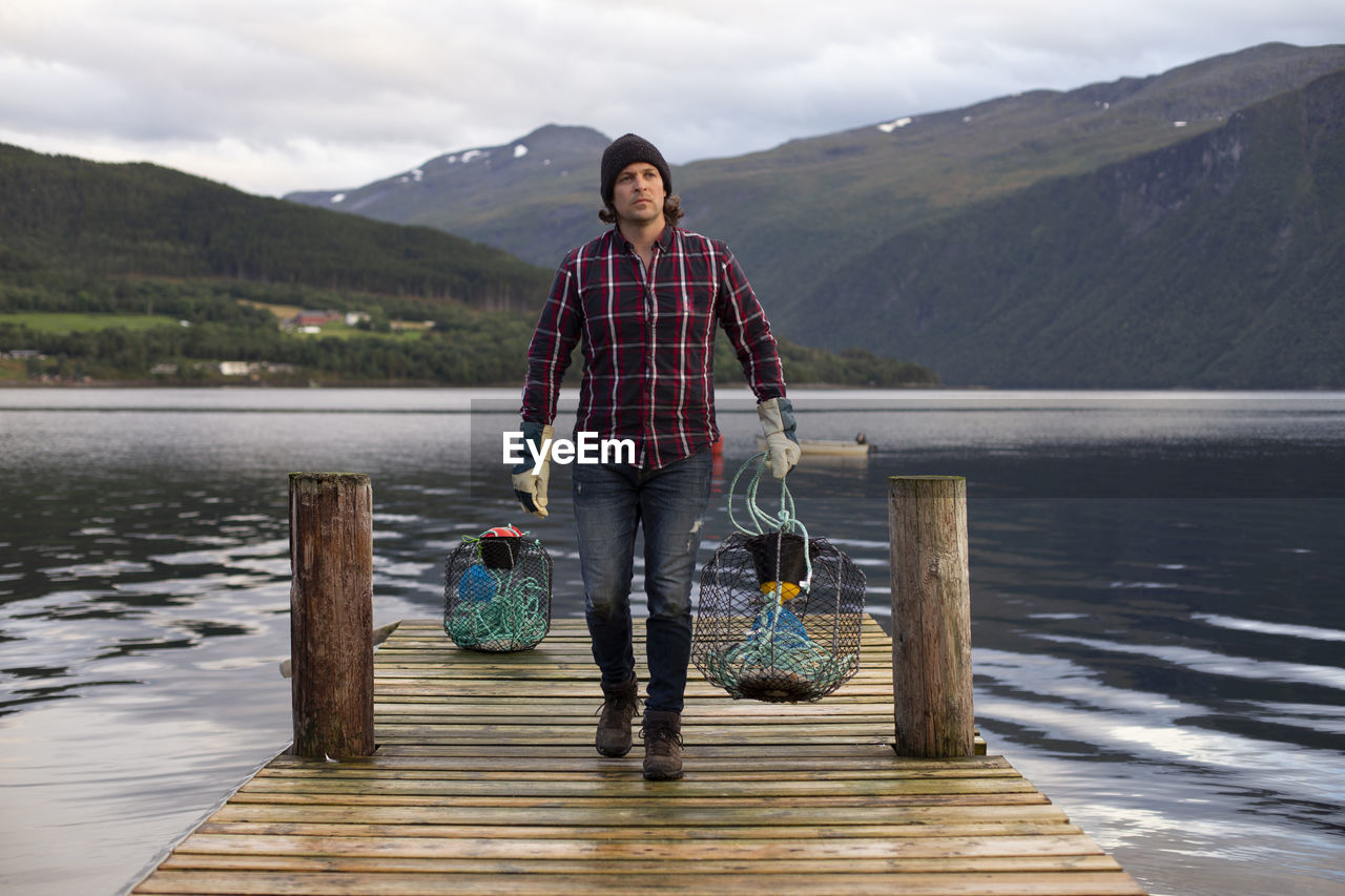 A satisfied fisherman returns from cleaning his crab pots