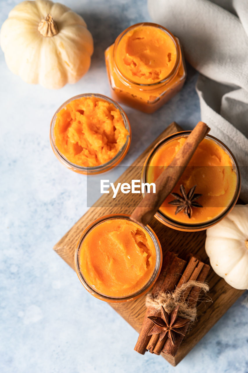 Organic pumpkin or sweet potato puree. ingredient for autumn or winter food.