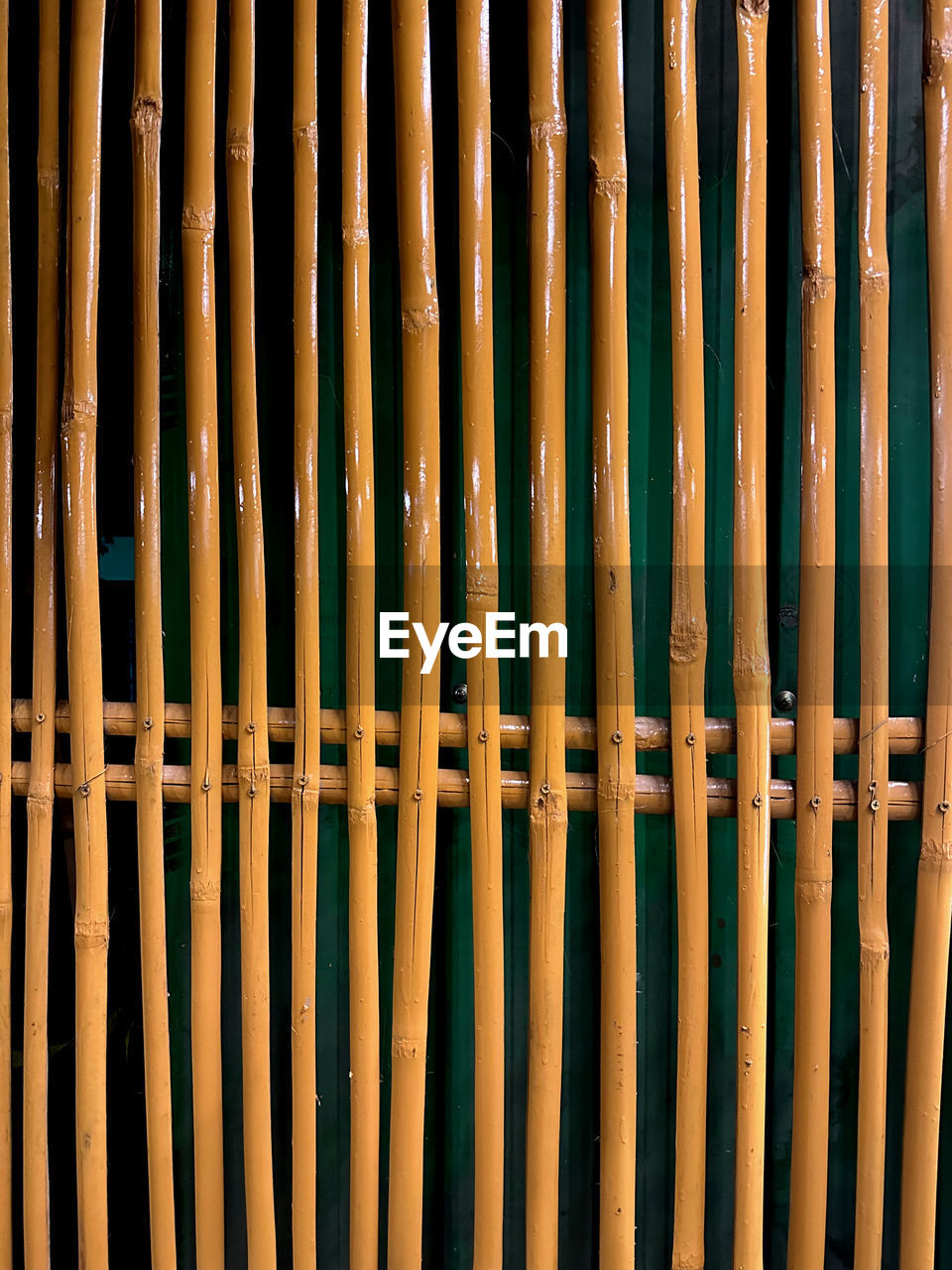 full frame, wood, backgrounds, pattern, no people, bamboo, line, close-up, metal, interior design, security, window covering, day, protection, repetition, architecture, outdoors, yellow, brown, side by side, textured, in a row, fence