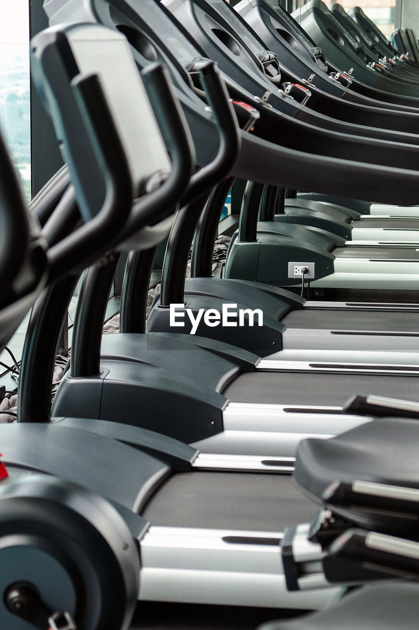 Detail image of treadmill in fitness room background 