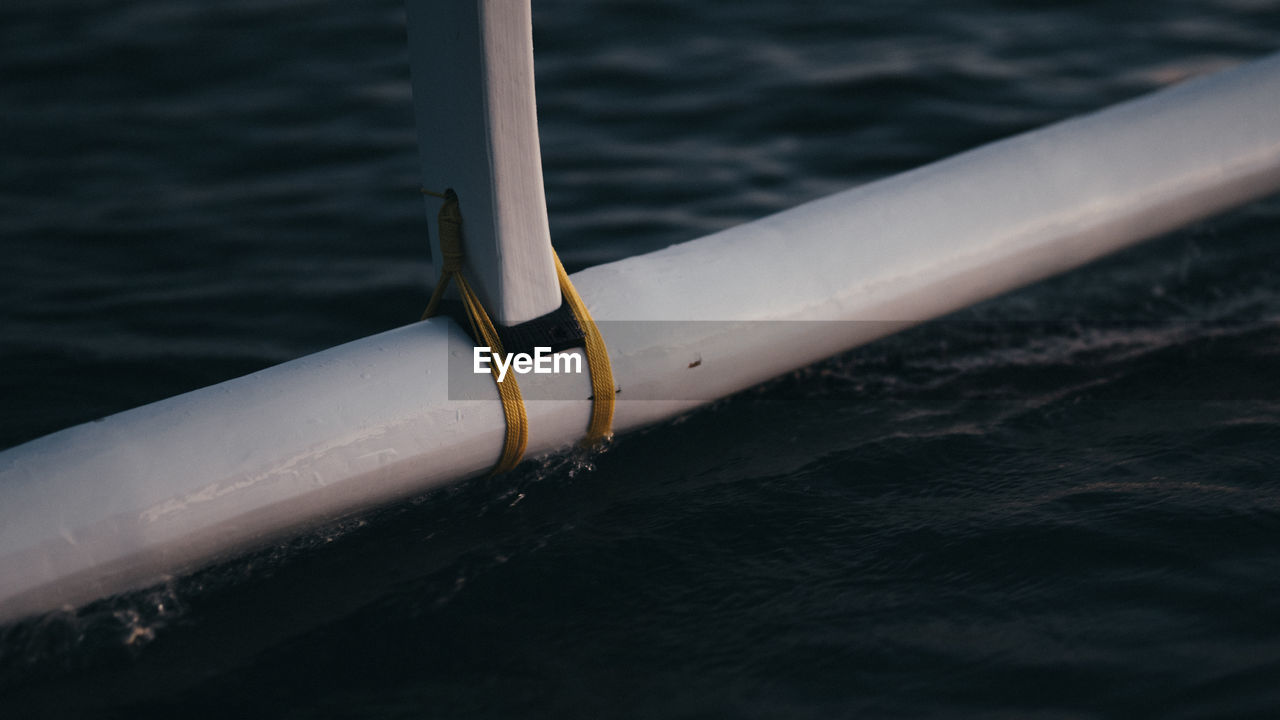 High angle view of railing against sea