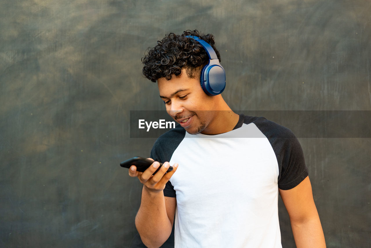 Young man using mobile phone