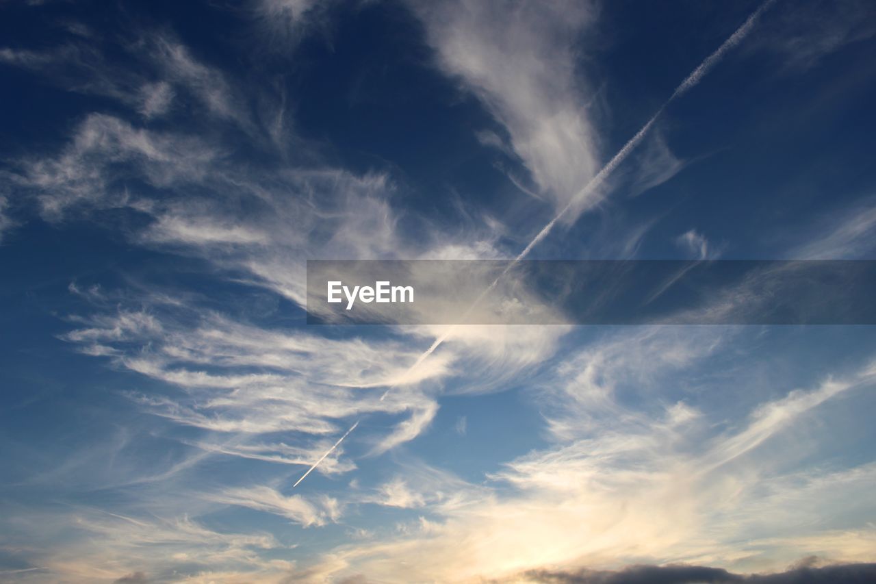 Low angle view of vapor trail in sky