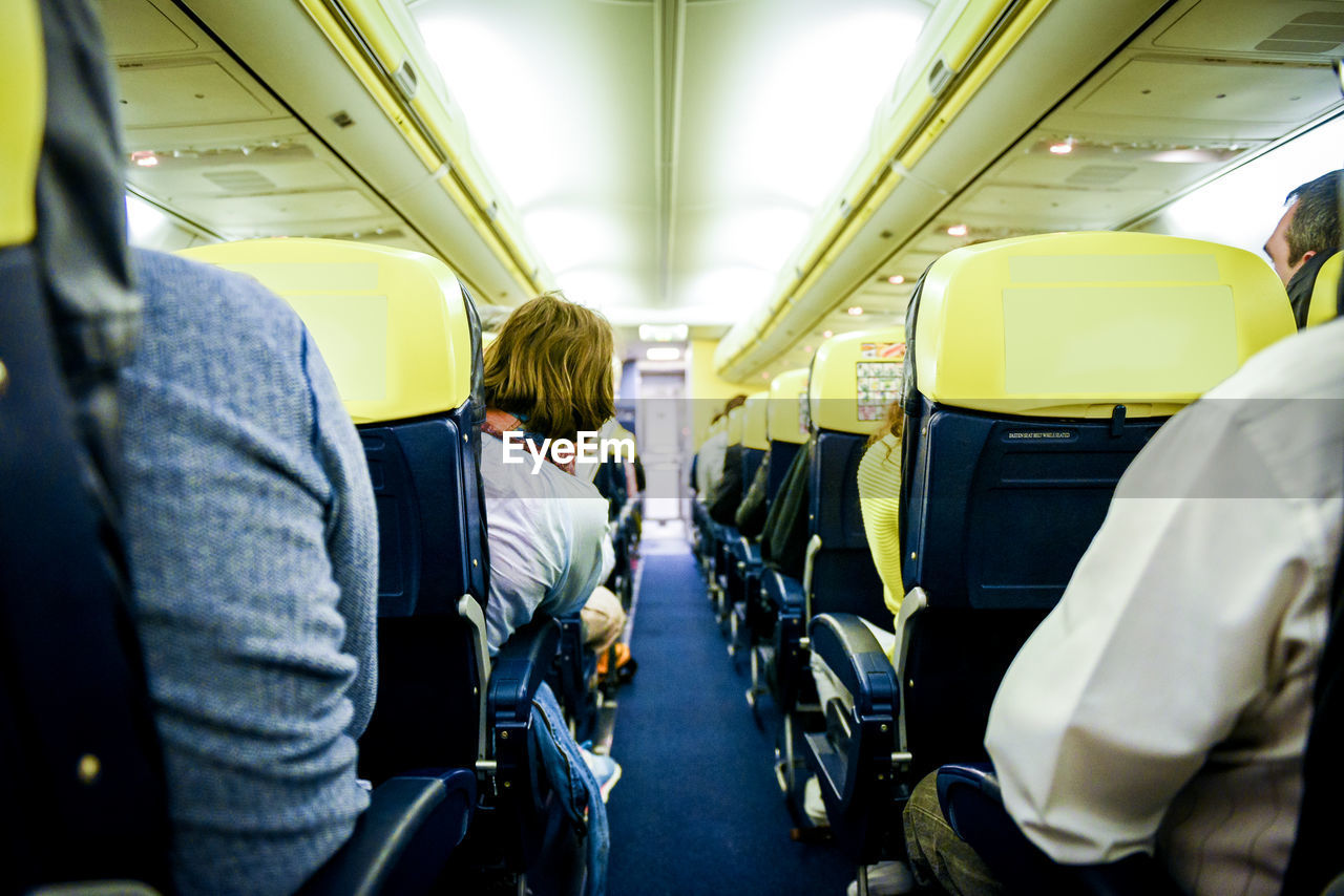 People traveling in airplane