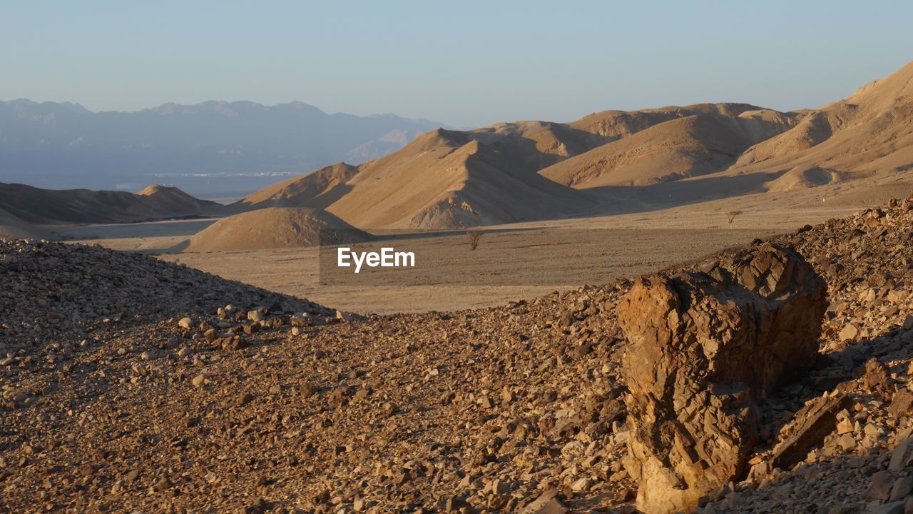 Scenic view of desert against sky