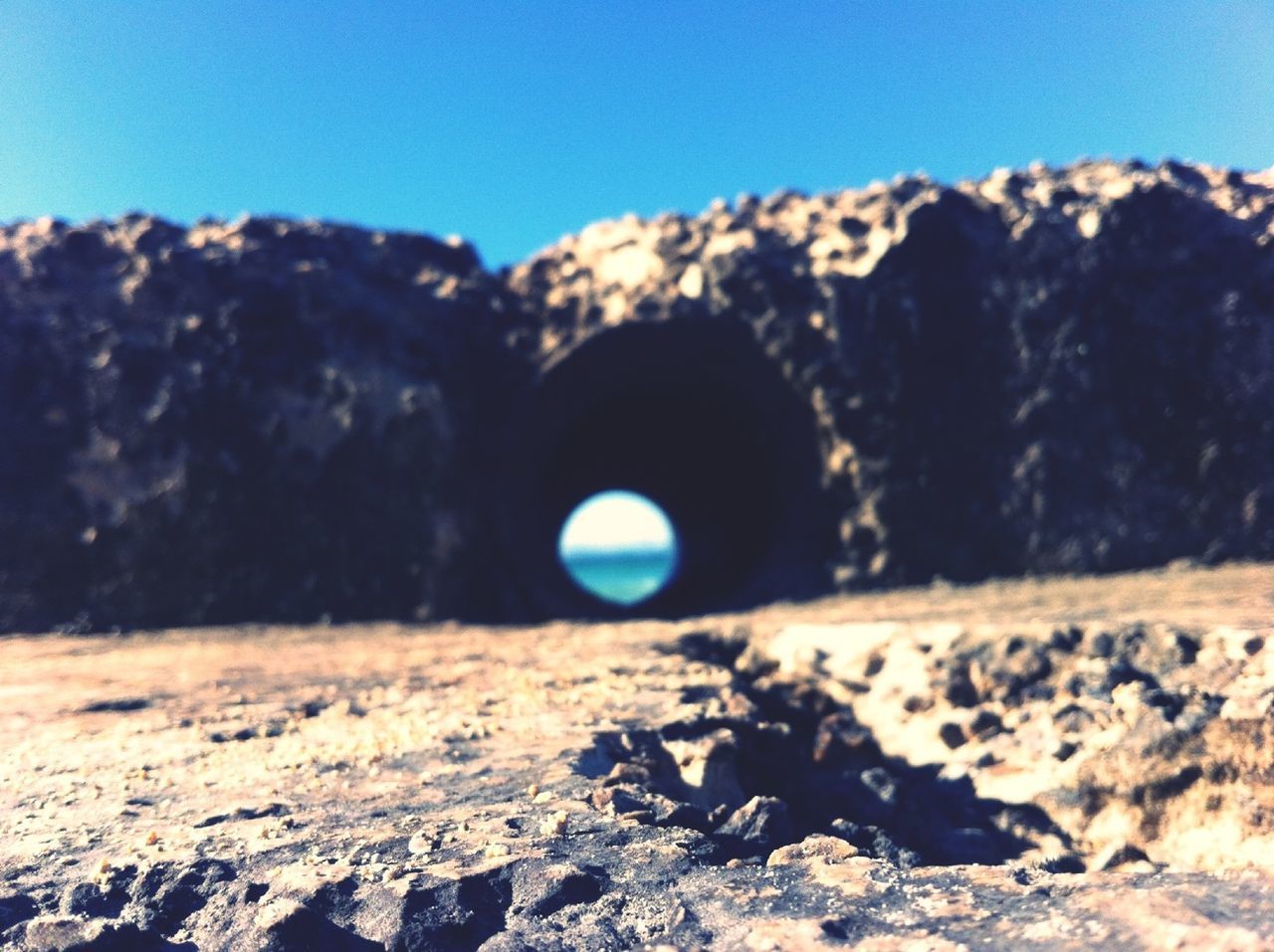 SURFACE LEVEL OF LANDSCAPE AGAINST BLUE SKY