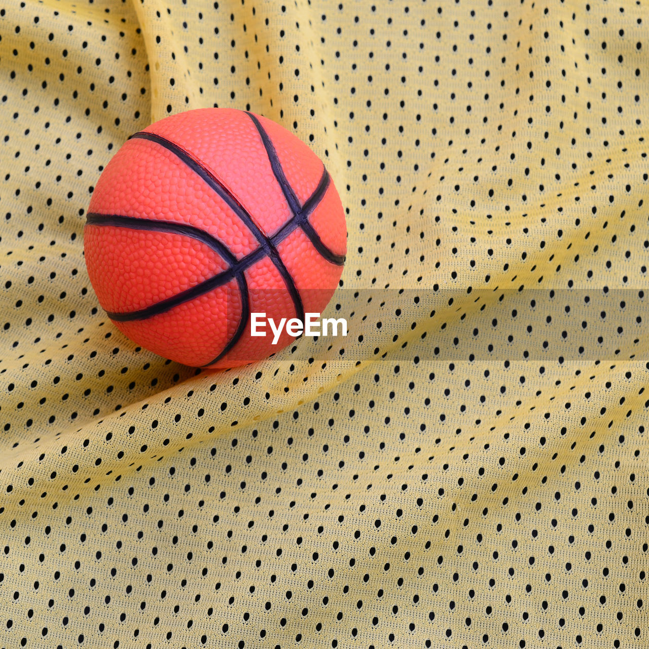 High angle view of basketball on fabric