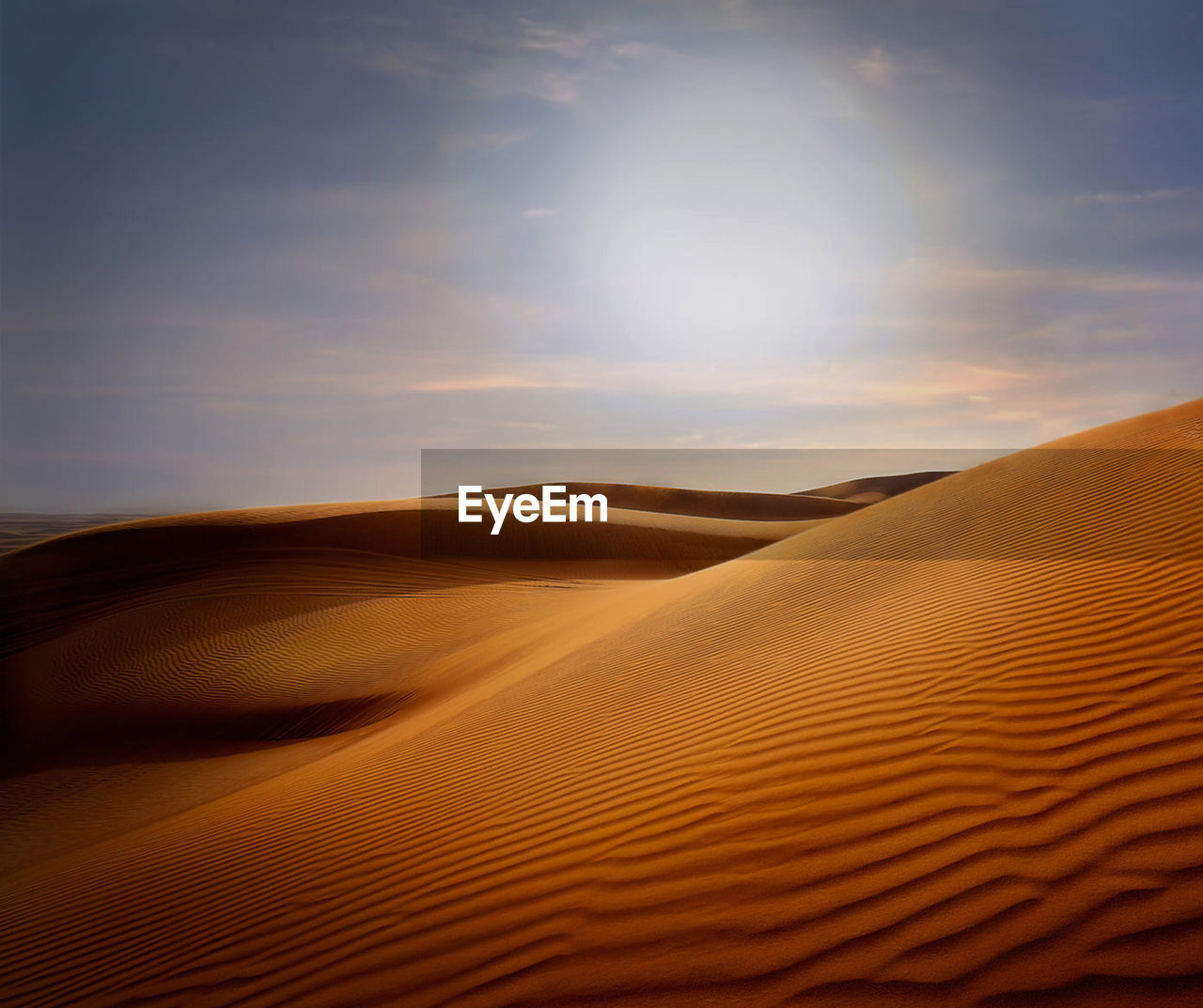 Scenic view of desert against sky