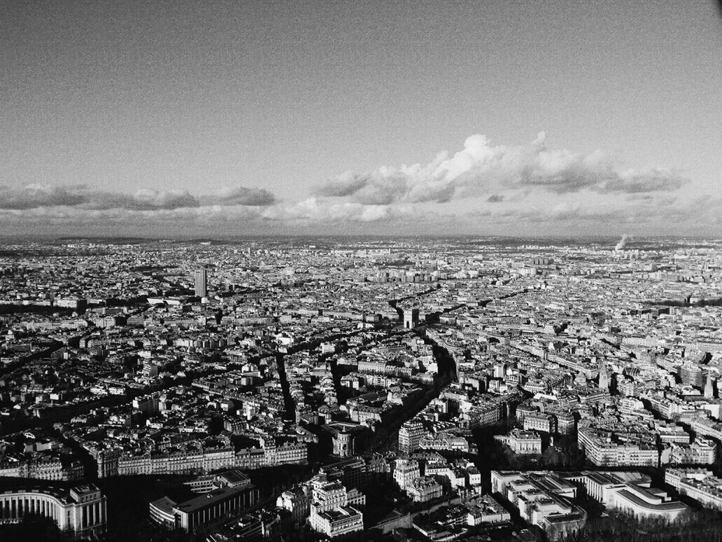 Aerial view of cityscape against sky