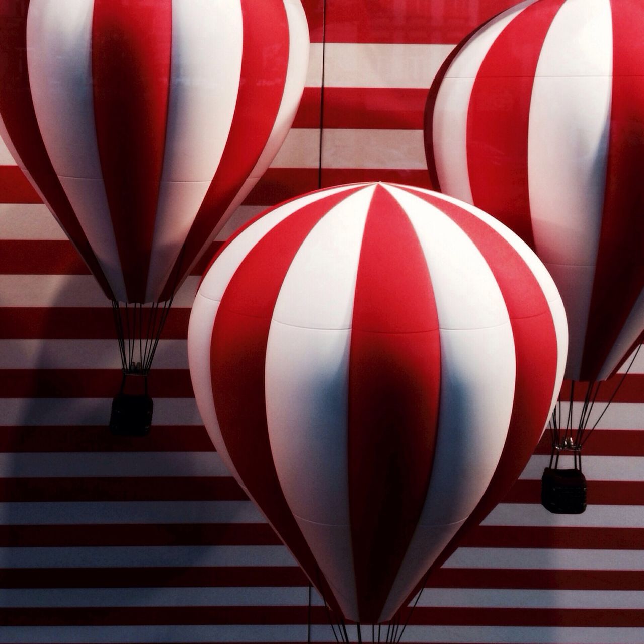 Replica of hot air balloons in display at store