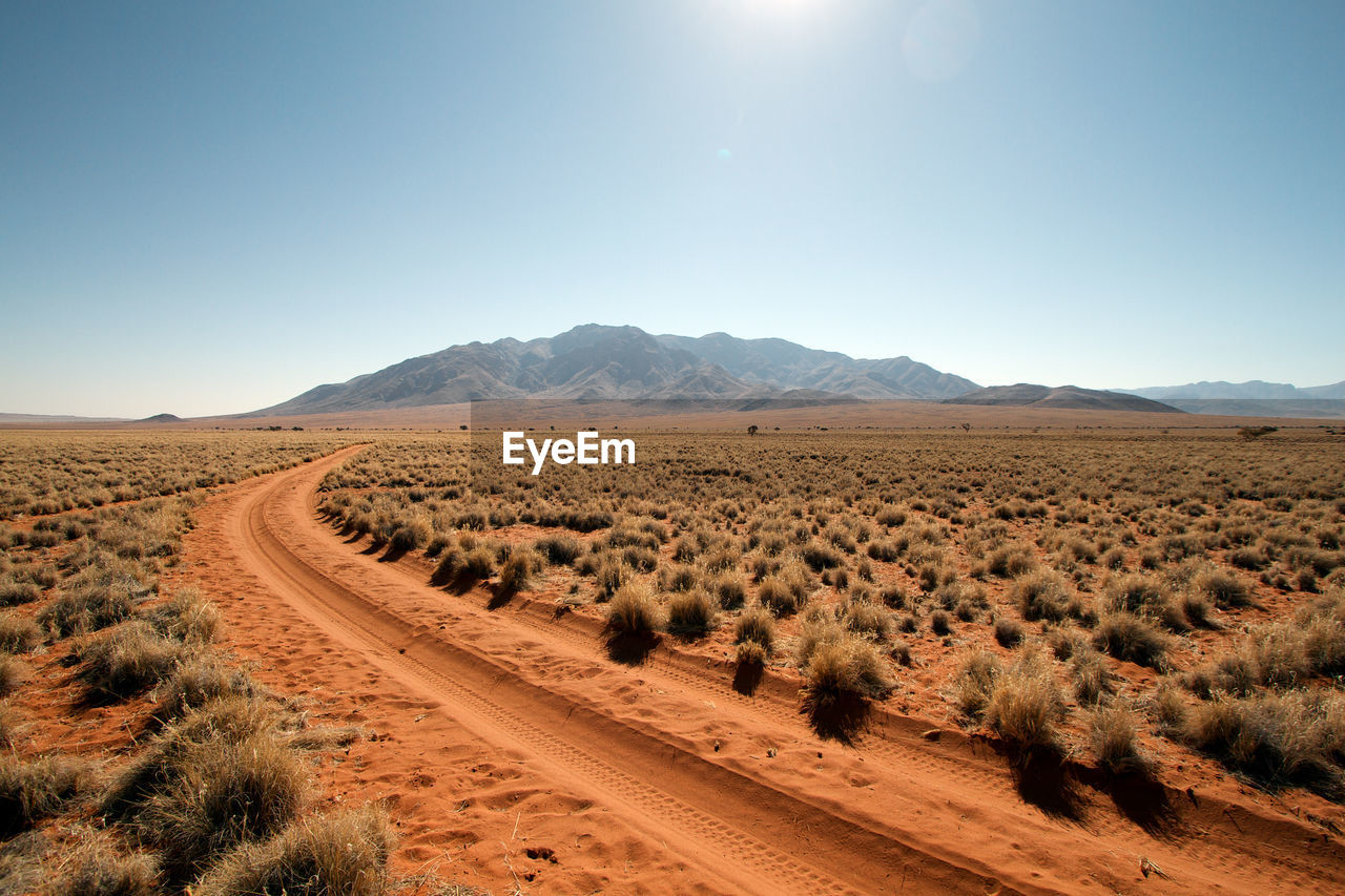 Scenic view of desert against sky