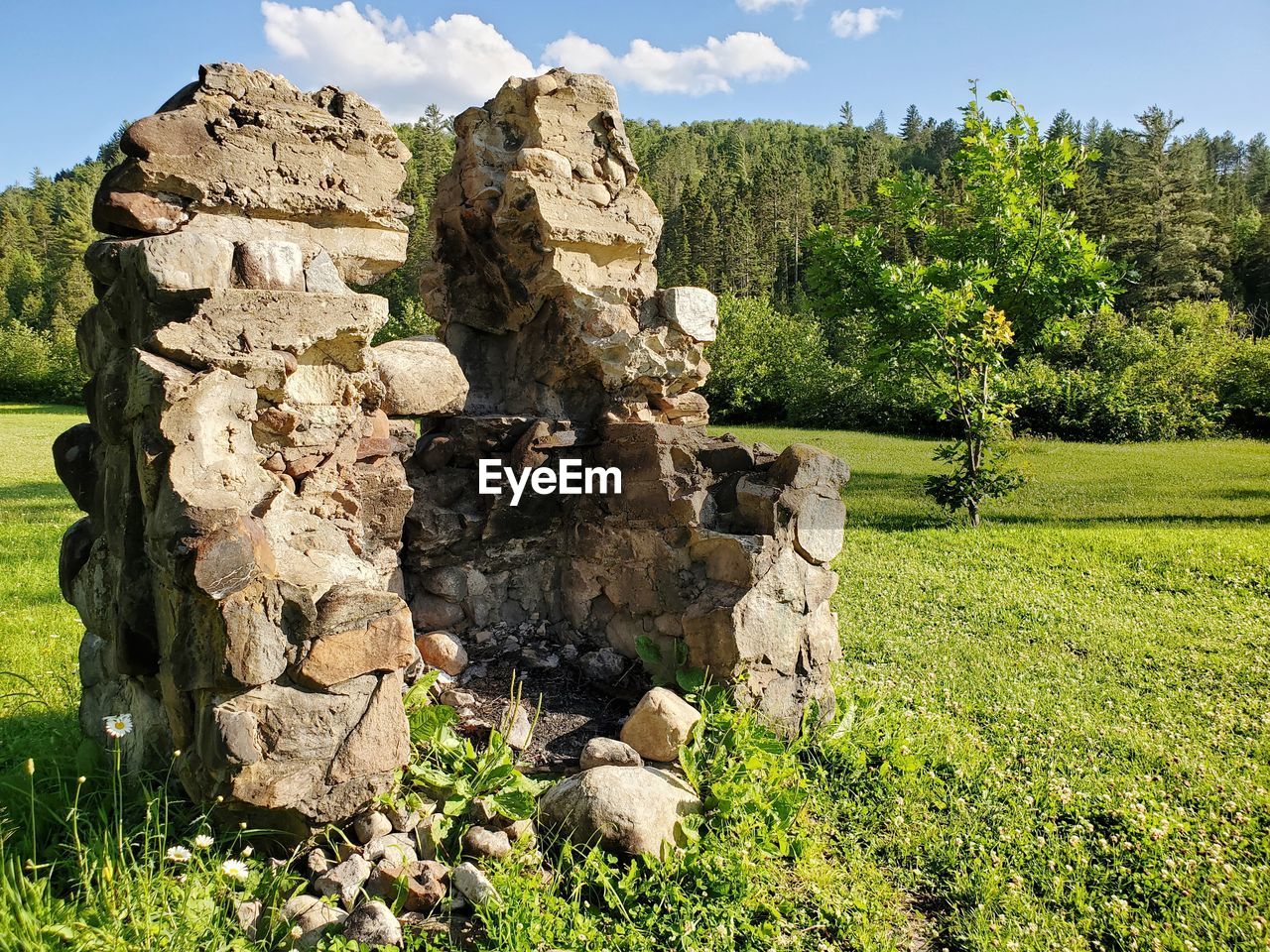 View of rocks fireplace on field