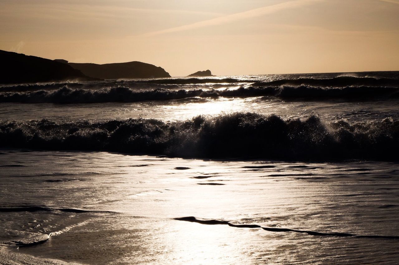 Scenic view of sea at sunset