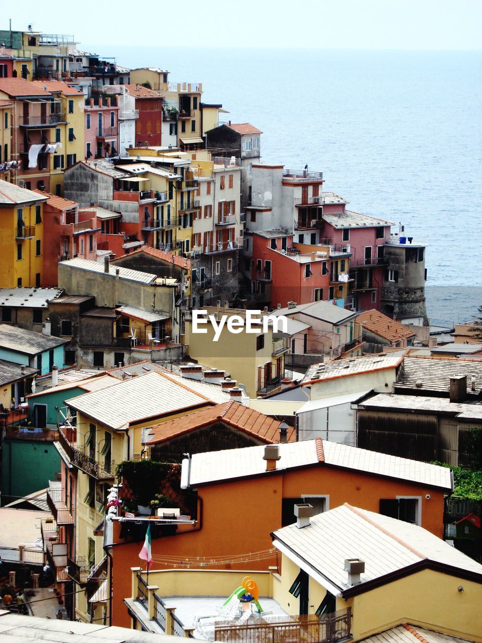 High angle view of houses by sea