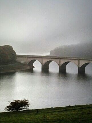 BRIDGE OVER RIVER WITH BRIDGE IN BACKGROUND