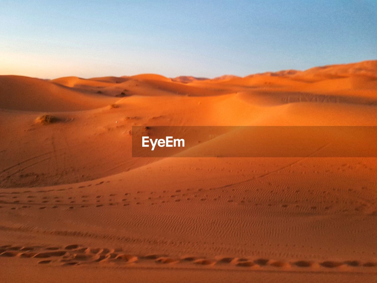 Scenic view of desert against sky