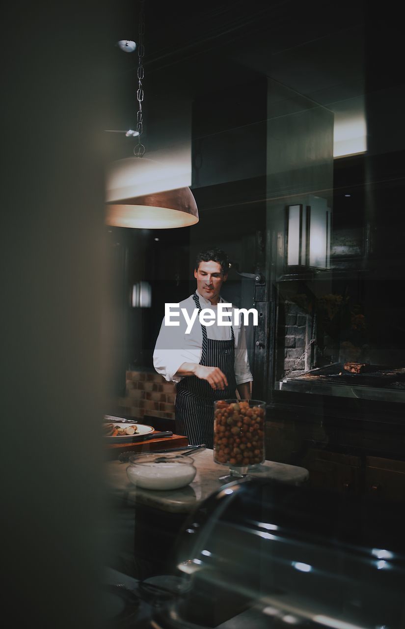 Chef preparing food in restaurant