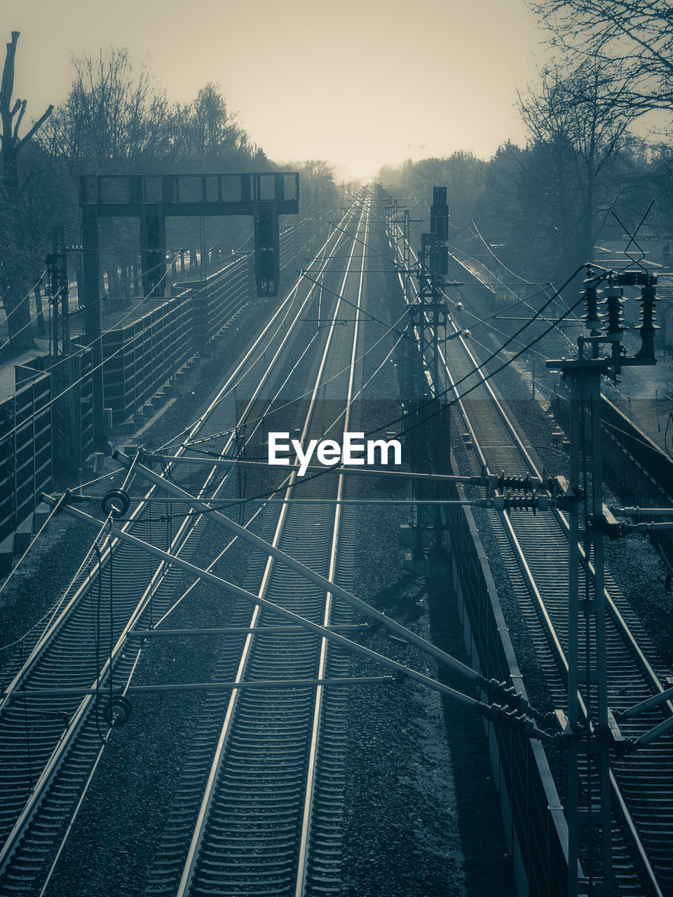 Railroad tracks against clear sky