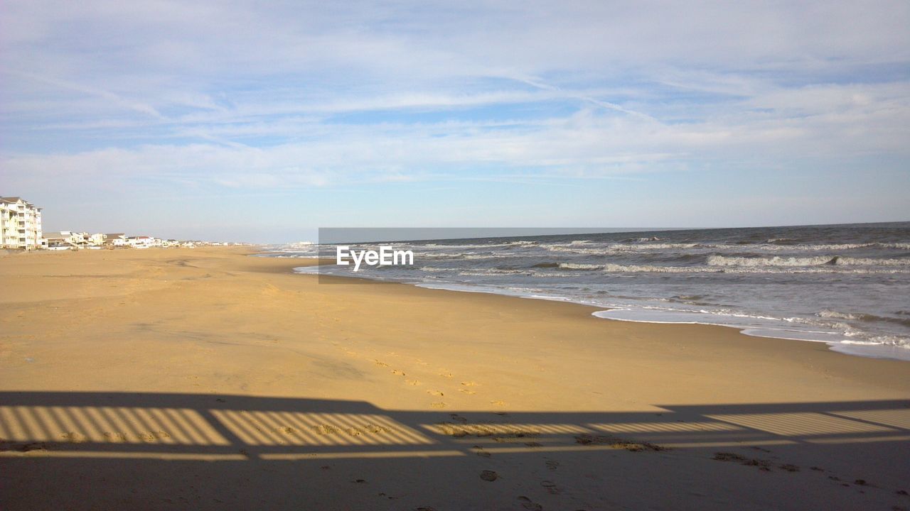 VIEW OF BEACH AGAINST SKY