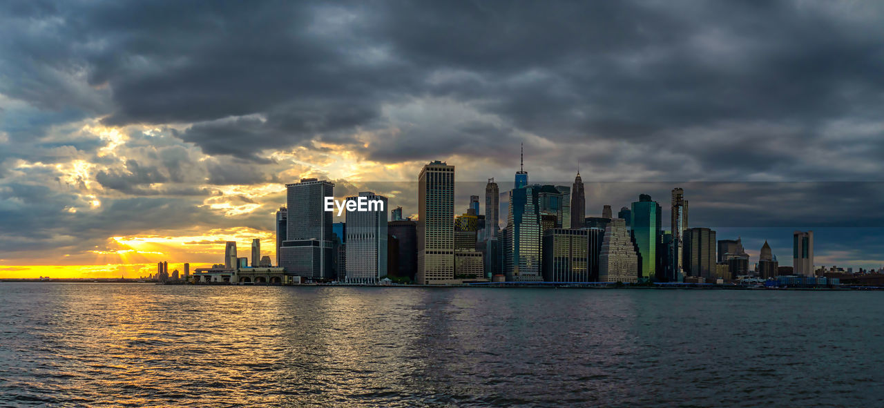 Panoramic lower manhattan skyline at sunset