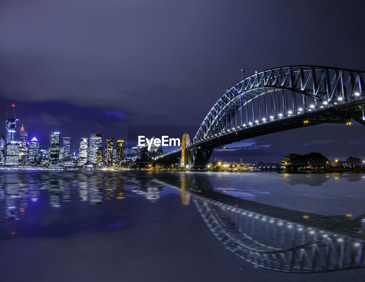 ILLUMINATED BRIDGE OVER CITY