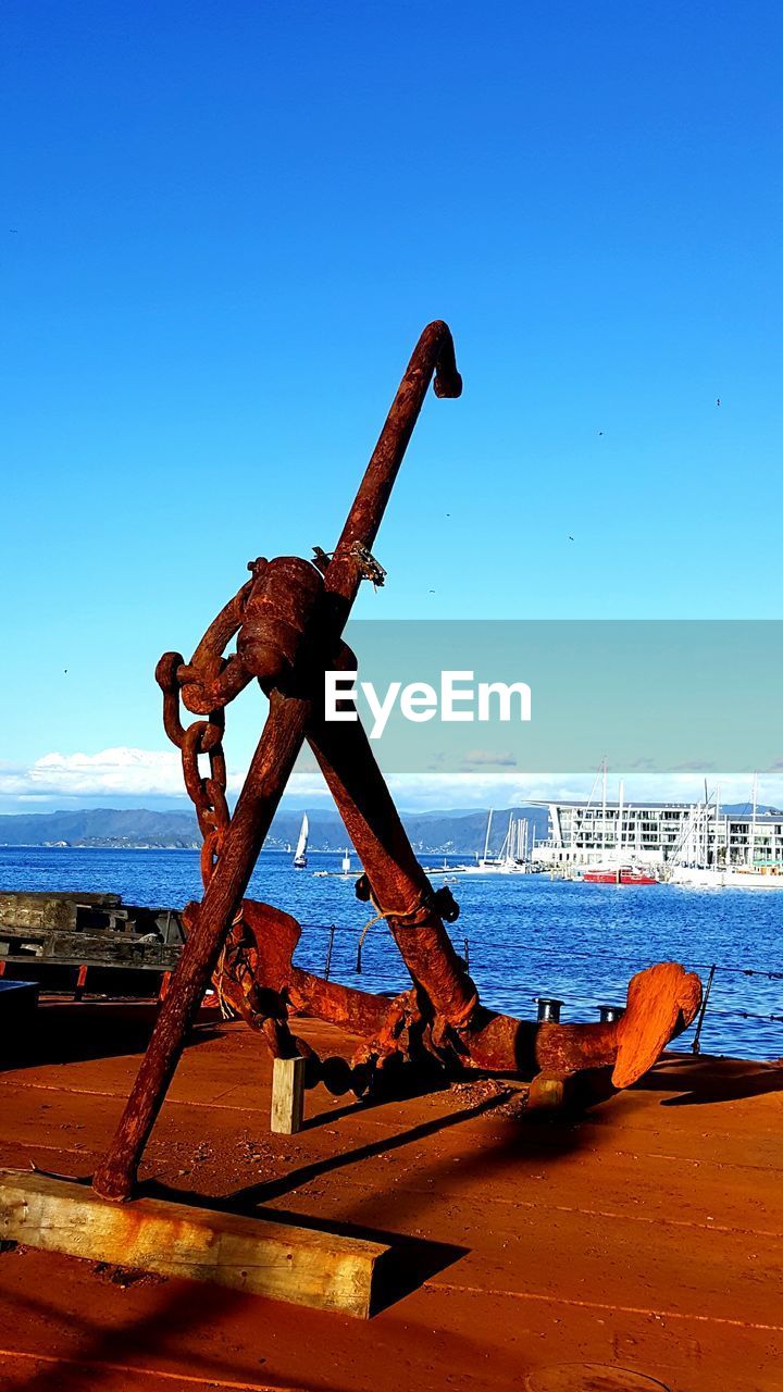 TRADITIONAL WINDMILL AGAINST BLUE SKY