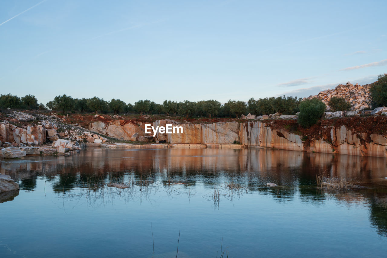 SCENIC VIEW OF RIVER BY TREES AGAINST SKY